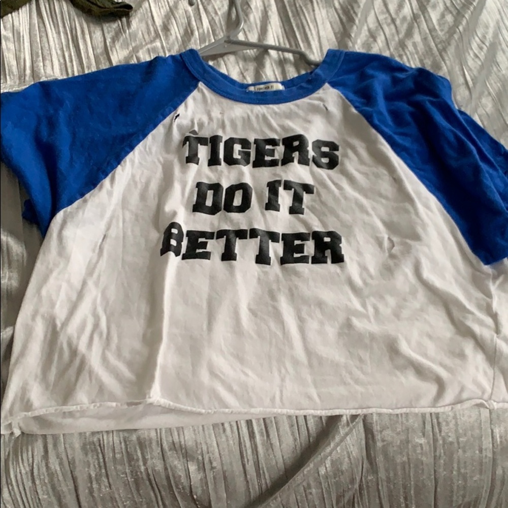 blue and white crop top with holes